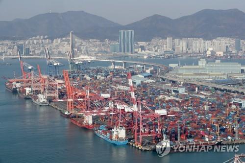 containers are stacked at a port southeast of Busan .jpg containers are stacked at a port southeast of Busan .jpg